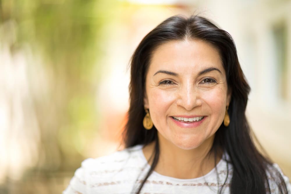 featured imaged for services post, smiling hispanic older female